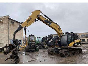 Caterpillar 323 DL + Silvatec 560  - حصادة الأخشاب