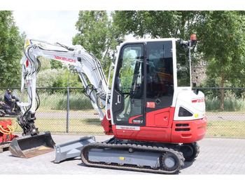 حفارة مُصَّغرة Takeuchi TB235-2 | TREE CUTTER | GRAB | TILT + 5 ATTACHMENTS: صورة 4