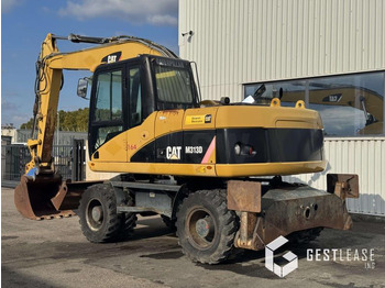 حفارة دولاب Caterpillar M313D: صورة 2