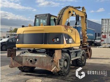 حفارة دولاب Caterpillar M313D: صورة 3