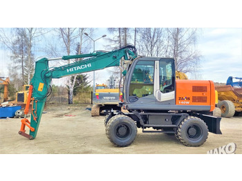 حفارة دولاب HITACHI ZX140W-3