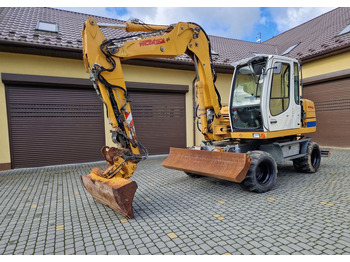 حفارة دولاب LIEBHERR A 311