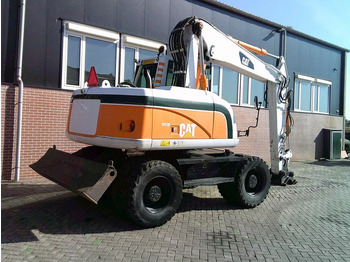 حفارة دولاب Caterpillar M313D: صورة 4