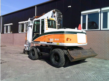 حفارة دولاب Caterpillar M313D: صورة 2