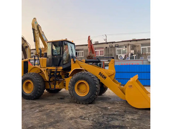 اللودر بعجل CATERPILLAR