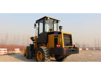 اللودر بعجل CATERPILLAR