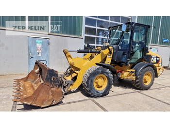 اللودر بعجل CATERPILLAR