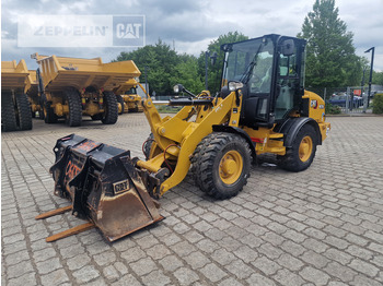 اللودر بعجل CATERPILLAR