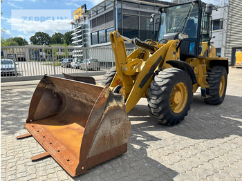 اللودر بعجل CATERPILLAR