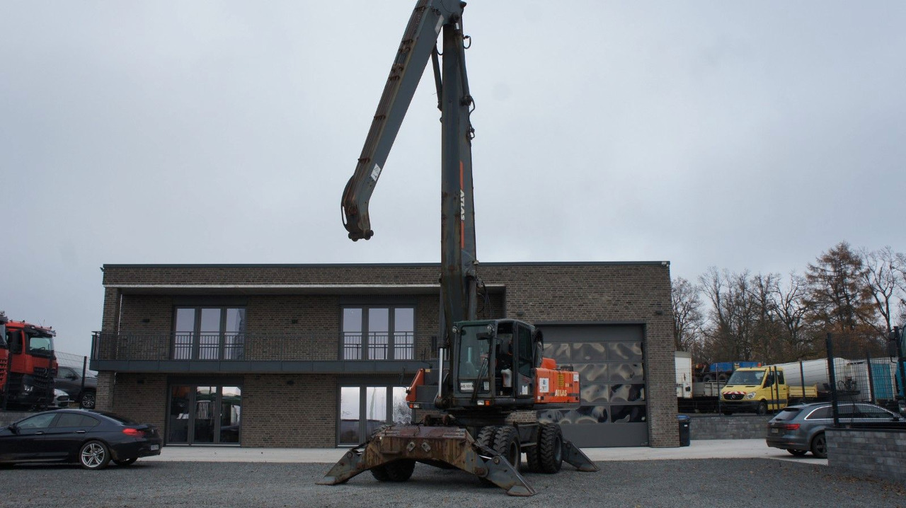 Atlas 350 MH Mobilbagger Umschlagbagger Pratzen - حفارة دولاب: صورة 1 Atlas 350 MH Mobilbagger Umschlagbagger Pratzen - حفارة دولاب: صورة 1