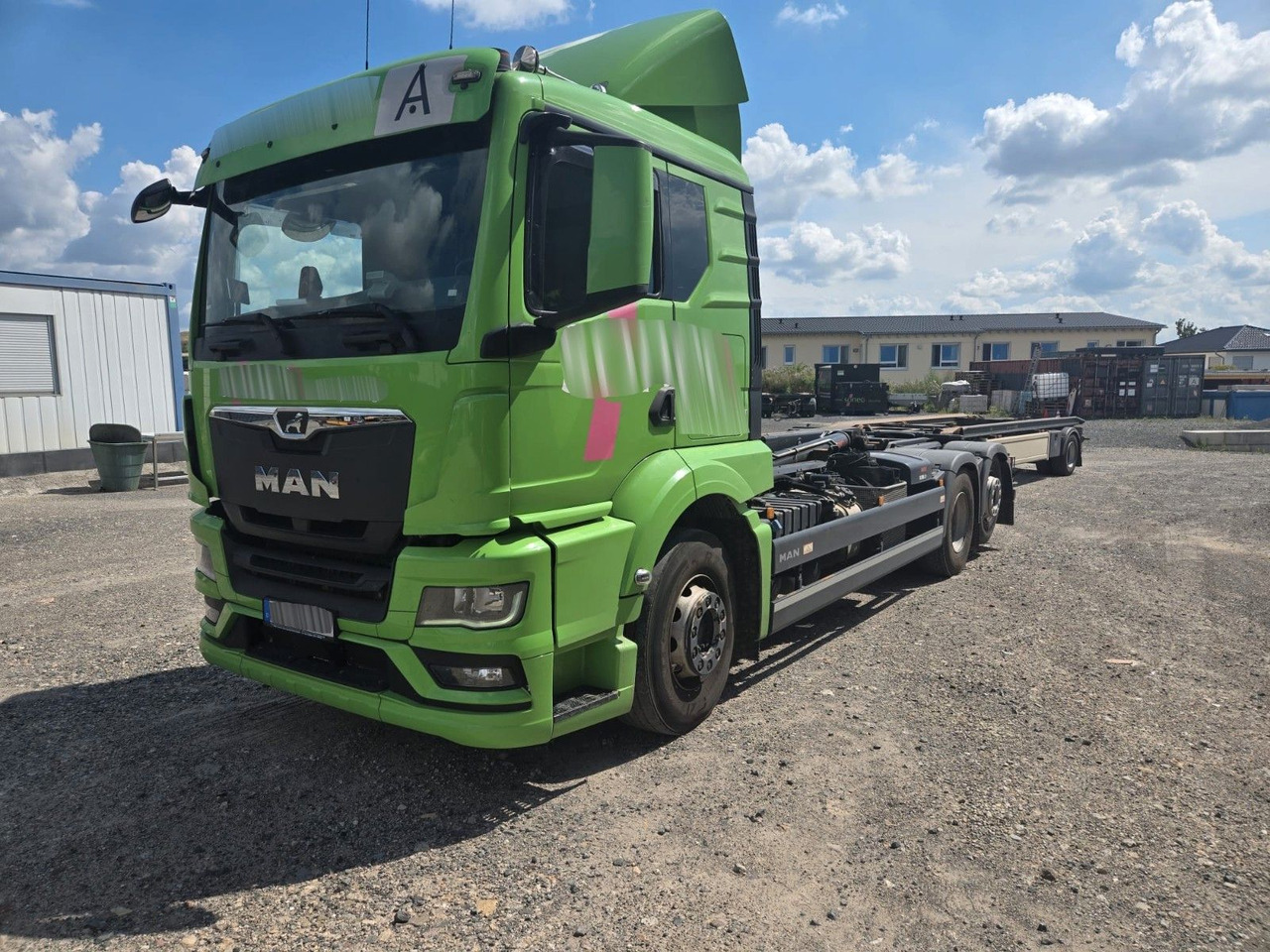 MAN TGS 26.510 Abrollkipper HIAB Lift -Lenkachse - شاحنة ذات خطاف: صورة 1 MAN TGS 26.510 Abrollkipper HIAB Lift -Lenkachse - شاحنة ذات خطاف: صورة 1