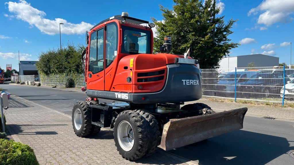 Terex TW85 Mobilbagger 8600 Kg Verstellausleger Terex TW85 Mobilbagger 8600 Kg Verstellausleger - حفارة دولاب: صورة 4 Terex TW85 Mobilbagger 8600 Kg Verstellausleger Terex TW85 Mobilbagger 8600 Kg Verstellausleger - حفارة دولاب: صورة 4
