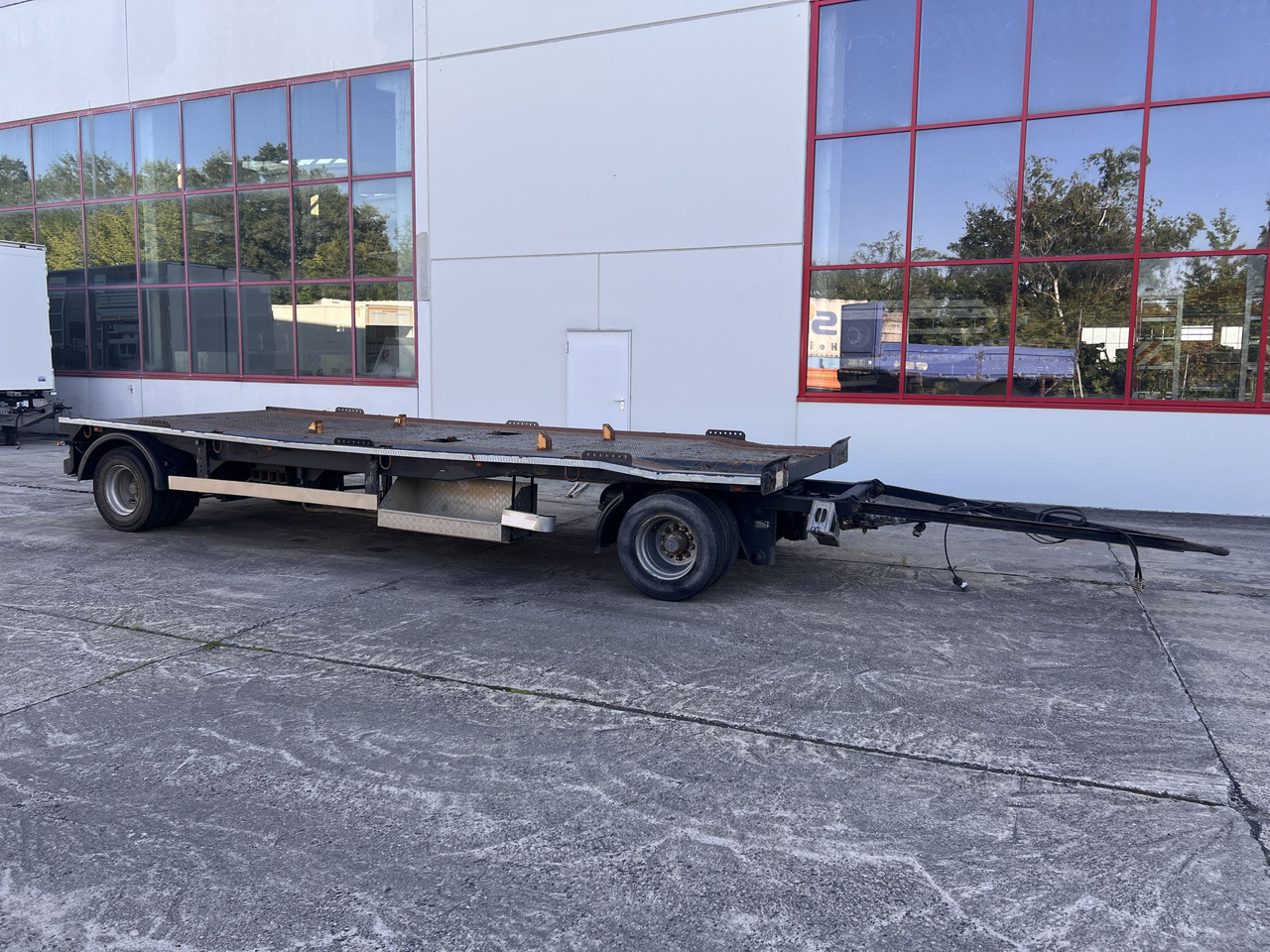 Dinkel DAC 18000 2 Achs Kombi- Anhänger für Abroll- oder Absetzmulden oder Tieflader - مقطورات مسطحة: صورة 1 Dinkel DAC 18000 2 Achs Kombi- Anhänger für Abroll- oder Absetzmulden oder Tieflader - مقطورات مسطحة: صورة 1