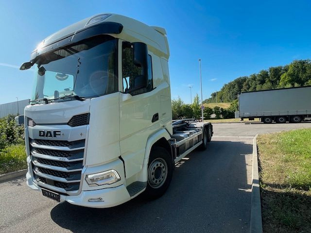 DAF FAN XF 480 mit VDL Abrollkipper DAF FAN XF 480 mit VDL Abrollkipper - شاحنة ذات خطاف: صورة 1 DAF FAN XF 480 mit VDL Abrollkipper DAF FAN XF 480 mit VDL Abrollkipper - شاحنة ذات خطاف: صورة 1