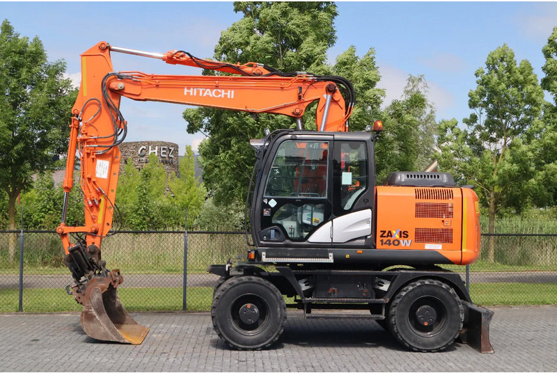 Hitachi ZX 140 W-5B | TILT QC | BUCKET | DOZER BLADE | DUTCH REG. - حفارة دولاب: صورة 1 Hitachi ZX 140 W-5B | TILT QC | BUCKET | DOZER BLADE | DUTCH REG. - حفارة دولاب: صورة 1
