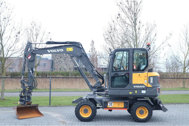 Volvo EW60E | DEMO | 30 KM/H | ROTOTILT + GRIPPER | BUCKET - حفارة دولاب: صورة 1 Volvo EW60E | DEMO | 30 KM/H | ROTOTILT + GRIPPER | BUCKET - حفارة دولاب: صورة 1