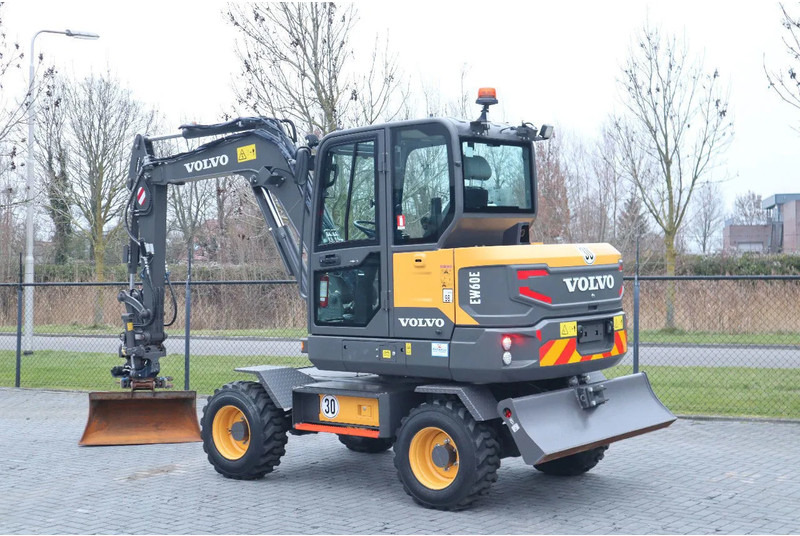 Volvo EW60E | DEMO | 30 KM/H | ROTOTILT + GRIPPER | BUCKET - حفارة دولاب: صورة 3 Volvo EW60E | DEMO | 30 KM/H | ROTOTILT + GRIPPER | BUCKET - حفارة دولاب: صورة 3