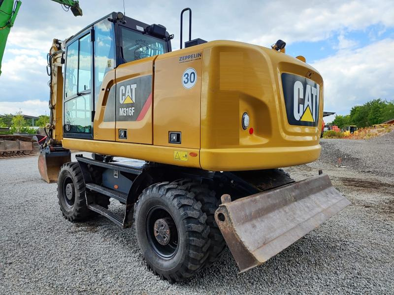 Caterpillar M316F - حفارة دولاب: صورة 1 Caterpillar M316F - حفارة دولاب: صورة 1