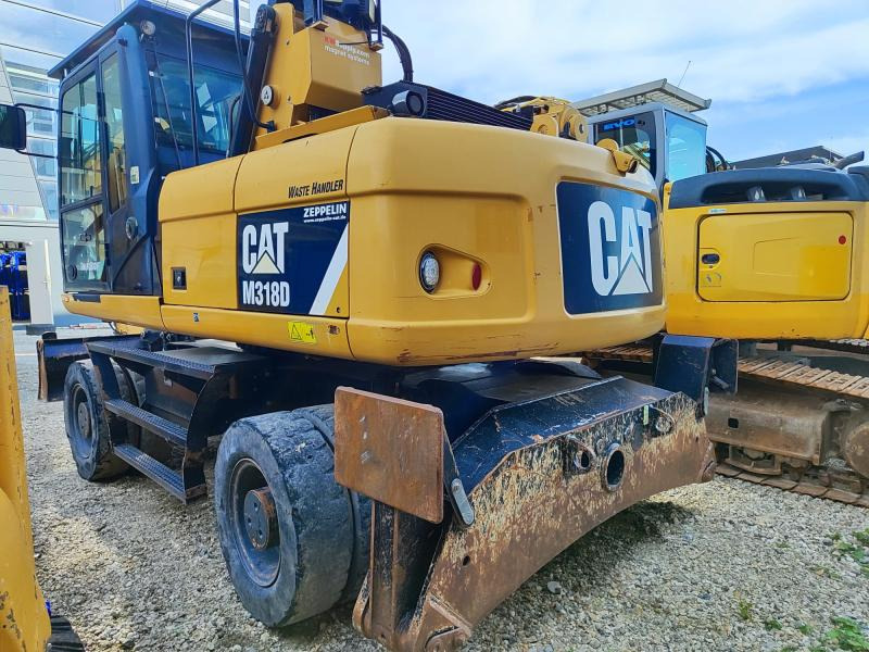 Caterpillar M318D MH - حفارة دولاب: صورة 1 Caterpillar M318D MH - حفارة دولاب: صورة 1