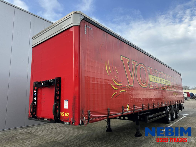 Kögel SN 24 Curtainsider - Pritsche Plane / Sliding roof - نصف مقطورة ستارة: صورة 1 Kögel SN 24 Curtainsider - Pritsche Plane / Sliding roof - نصف مقطورة ستارة: صورة 1