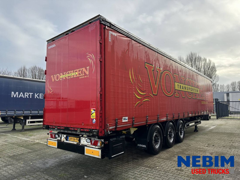 Kögel SN 24 Curtainsider - Pritsche Plane / Sliding roof - نصف مقطورة ستارة: صورة 2 Kögel SN 24 Curtainsider - Pritsche Plane / Sliding roof - نصف مقطورة ستارة: صورة 2