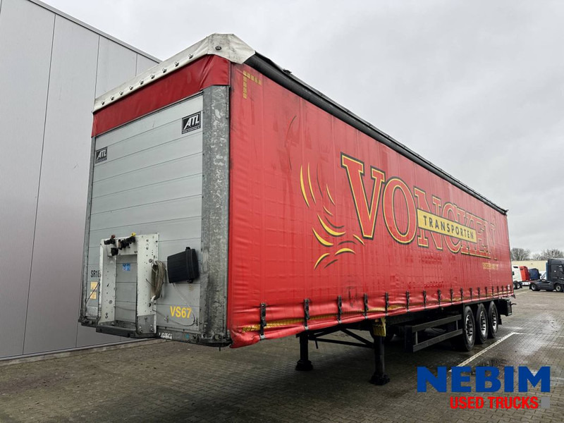 Schmitz Cargobull SCB*S3T - Curtainsider / Pritsche Plane / Sliding roof - عربة منخفضة مسطحة نصف مقطورة: صورة 1 Schmitz Cargobull SCB*S3T - Curtainsider / Pritsche Plane / Sliding roof - عربة منخفضة مسطحة نصف مقطورة: صورة 1