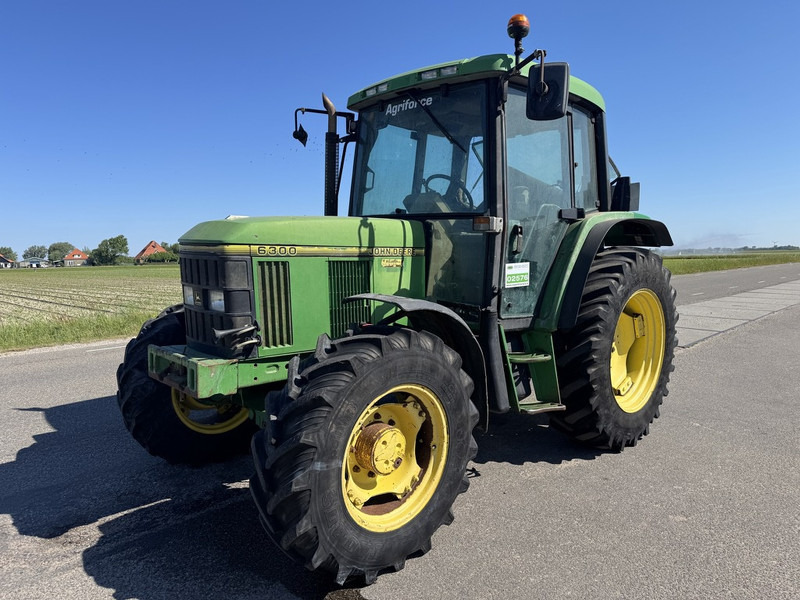 John Deere 6300 - جرار: صورة 1 John Deere 6300 - جرار: صورة 1