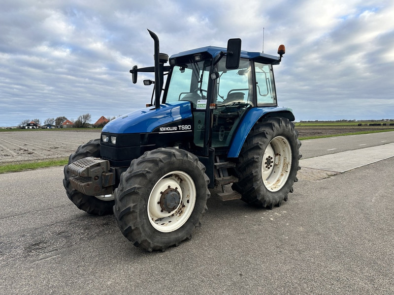 New Holland TS90 - جرار: صورة 1 New Holland TS90 - جرار: صورة 1