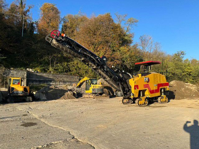 Caterpillar PM-313 - قشاطة أسفلت: صورة 1 Caterpillar PM-313 - قشاطة أسفلت: صورة 1