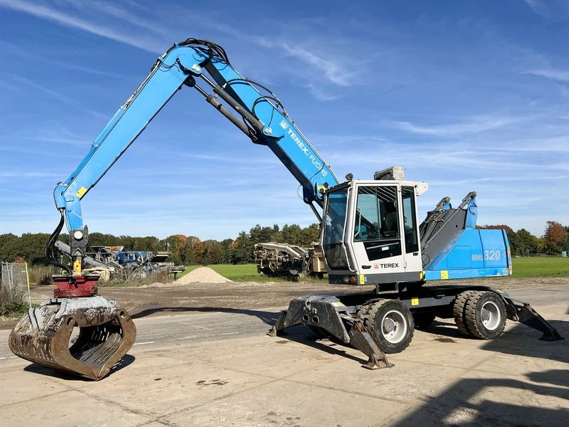 Terex Fuchs MHL 320 - معالج النفايات: صورة 1 Terex Fuchs MHL 320 - معالج النفايات: صورة 1