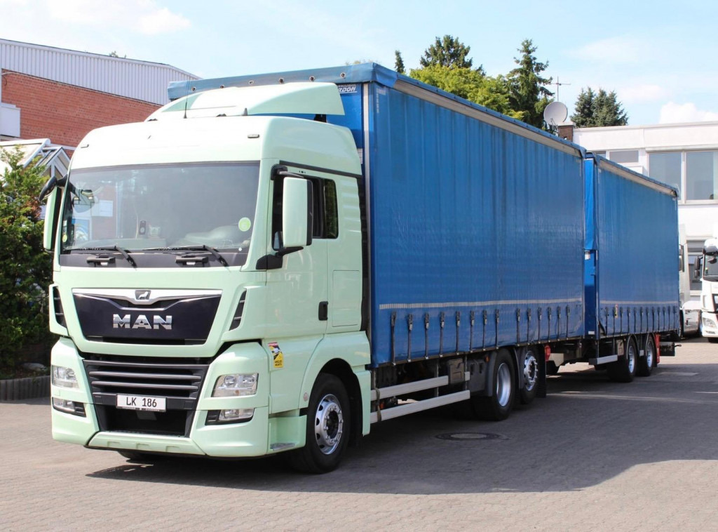 MAN TGX 26.460 Retarder Jumbo-Zug 120M3 Durchlade - شاحنة ستارة: صورة 1 MAN TGX 26.460 Retarder Jumbo-Zug 120M3 Durchlade - شاحنة ستارة: صورة 1