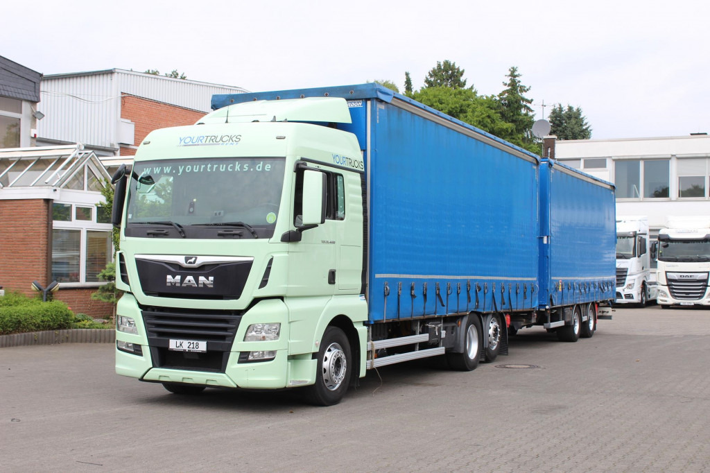 MAN TGX 26.460 Retarder Jumbo-Zug 120M3 Durchlade - شاحنة ستارة: صورة 1 MAN TGX 26.460 Retarder Jumbo-Zug 120M3 Durchlade - شاحنة ستارة: صورة 1