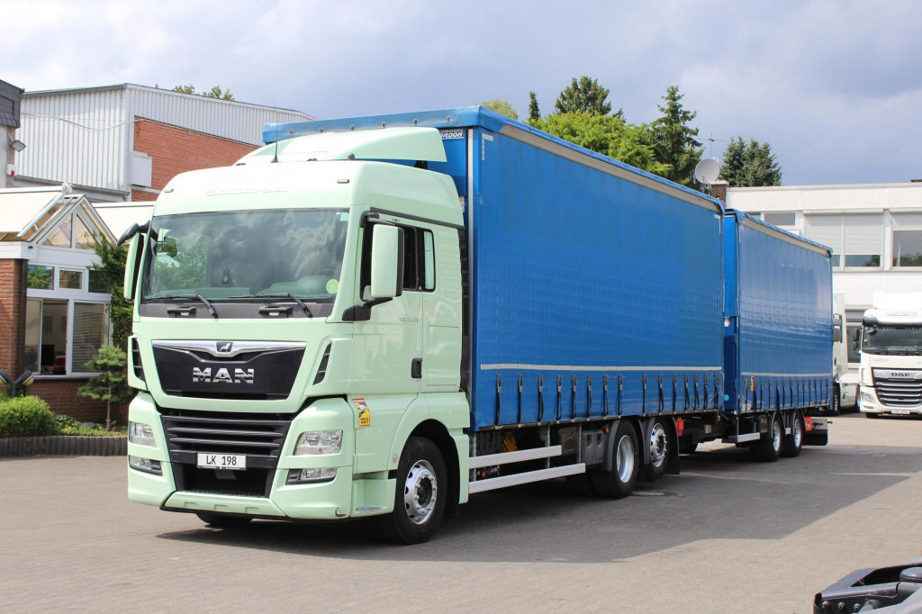 MAN TGX 26.460 Retarder Jumbo-Zug 120M3 Durchlade - شاحنة ستارة: صورة 1 MAN TGX 26.460 Retarder Jumbo-Zug 120M3 Durchlade - شاحنة ستارة: صورة 1