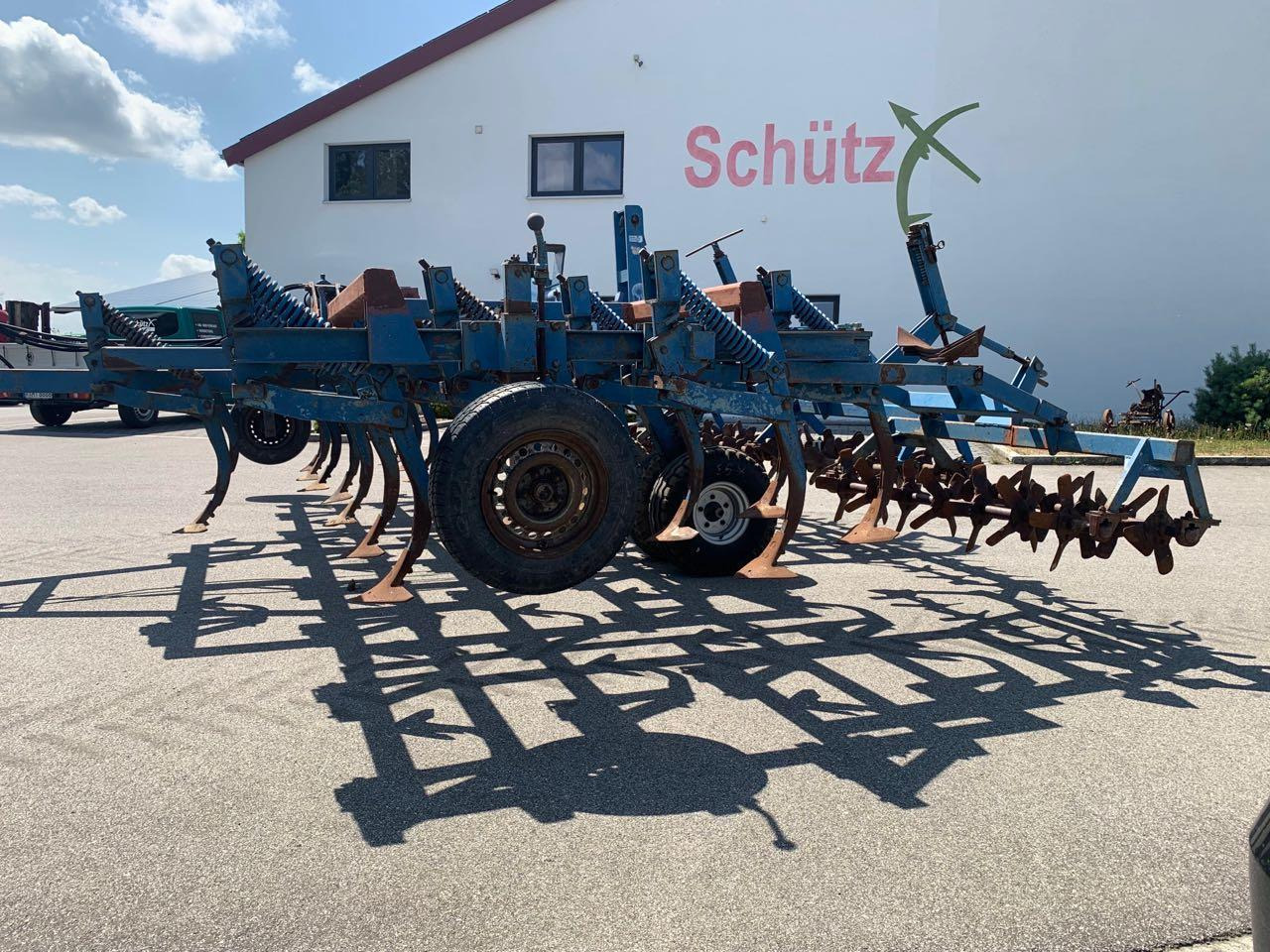 المحراث Rabe gezogener 4-balkiger Grubber mit Spatenrollegge: صورة 12 المحراث Rabe gezogener 4-balkiger Grubber mit Spatenrollegge: صورة 12