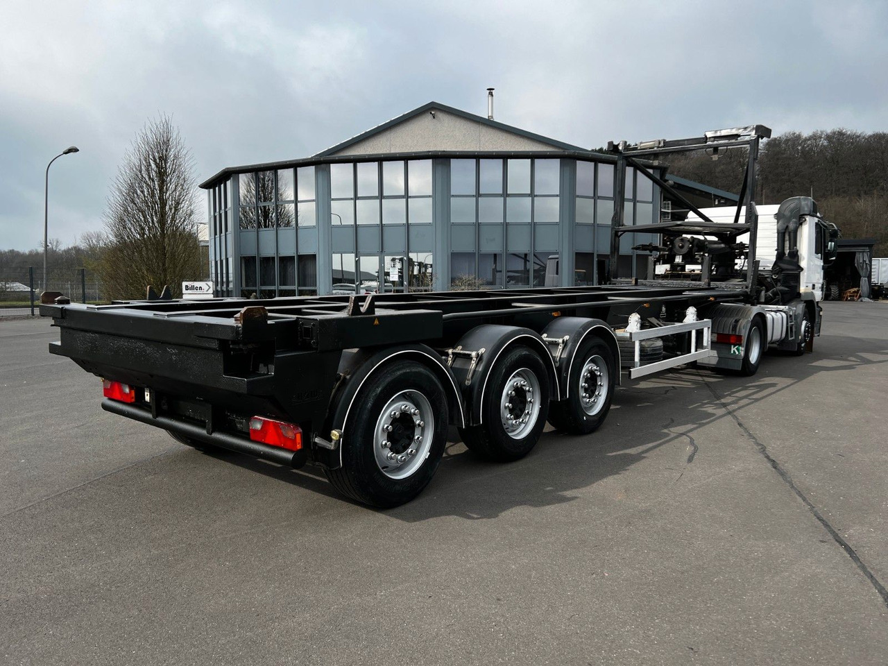 H&W 3- Achs Auflieger für Presscontainer H&W 3- Achs Auflieger für Presscontainer - نصف مقطورة لنقل الحاويات: صورة 1 H&W 3- Achs Auflieger für Presscontainer H&W 3- Achs Auflieger für Presscontainer - نصف مقطورة لنقل الحاويات: صورة 1