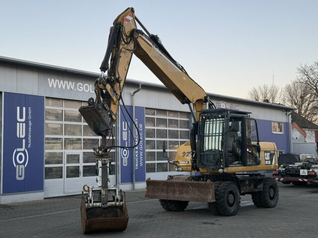 CAT M318D Mobilbagger *9.235 h *Schnellw. *Greifer - حفارة دولاب: صورة 1 CAT M318D Mobilbagger *9.235 h *Schnellw. *Greifer - حفارة دولاب: صورة 1