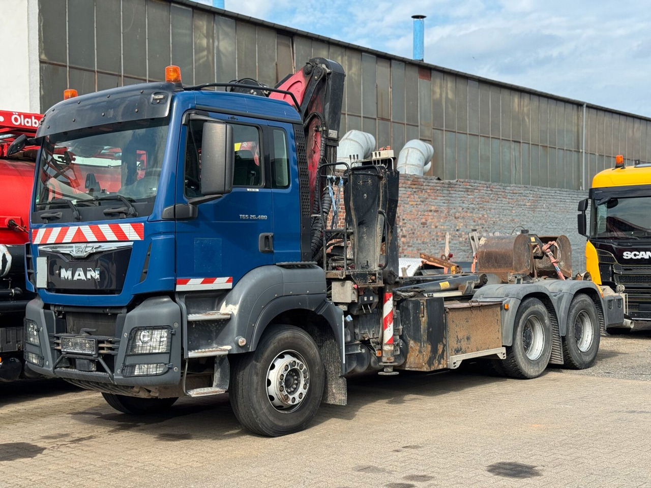 MAN TGS 28.480 6x4 Abrollkipper Kran Greifer 4,63 T - شاحنة ذات خطاف, شاحنة كرين: صورة 1 MAN TGS 28.480 6x4 Abrollkipper Kran Greifer 4,63 T - شاحنة ذات خطاف, شاحنة كرين: صورة 1