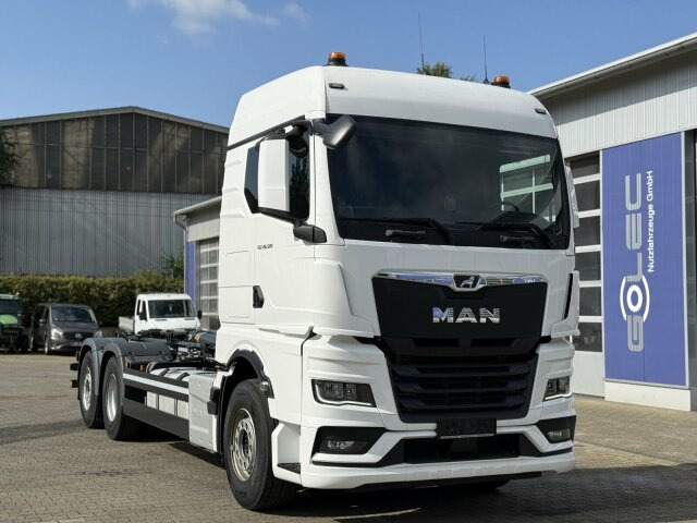 MAN TGX 26.520 6x2 Abrollkipper MEILLER RS 21.70 - شاحنة ذات خطاف: صورة 1 MAN TGX 26.520 6x2 Abrollkipper MEILLER RS 21.70 - شاحنة ذات خطاف: صورة 1