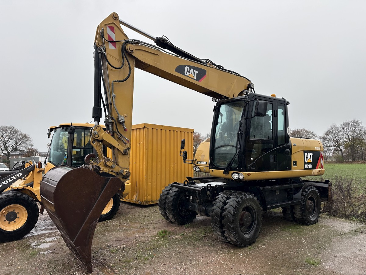 CATERPILLAR M 316 D full Hydr. Top Zustand German machine ! - حفارة دولاب: صورة 1 CATERPILLAR M 316 D full Hydr. Top Zustand German machine ! - حفارة دولاب: صورة 1
