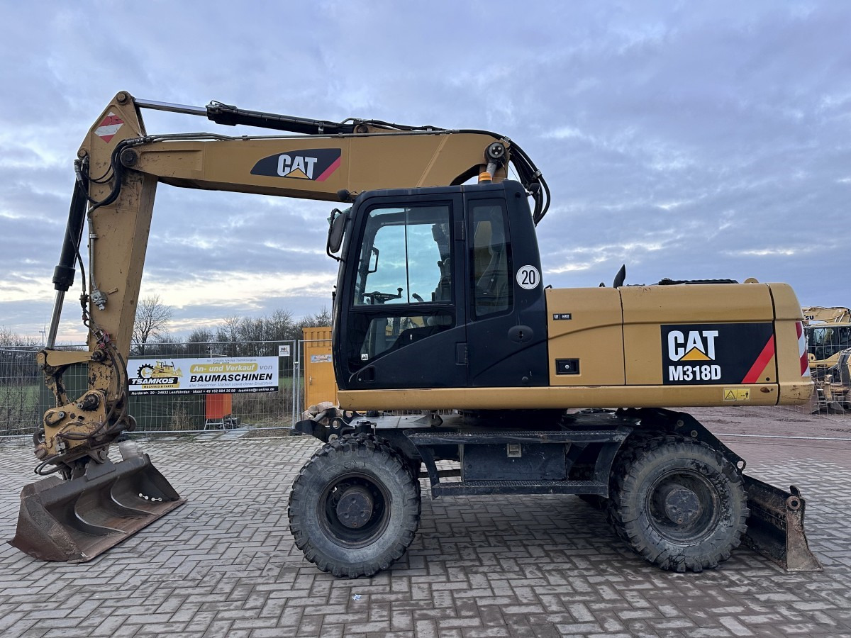 CATERPILLAR M 318 D full Hydr. Top Zustand German machine ! - حفارة دولاب: صورة 1 CATERPILLAR M 318 D full Hydr. Top Zustand German machine ! - حفارة دولاب: صورة 1