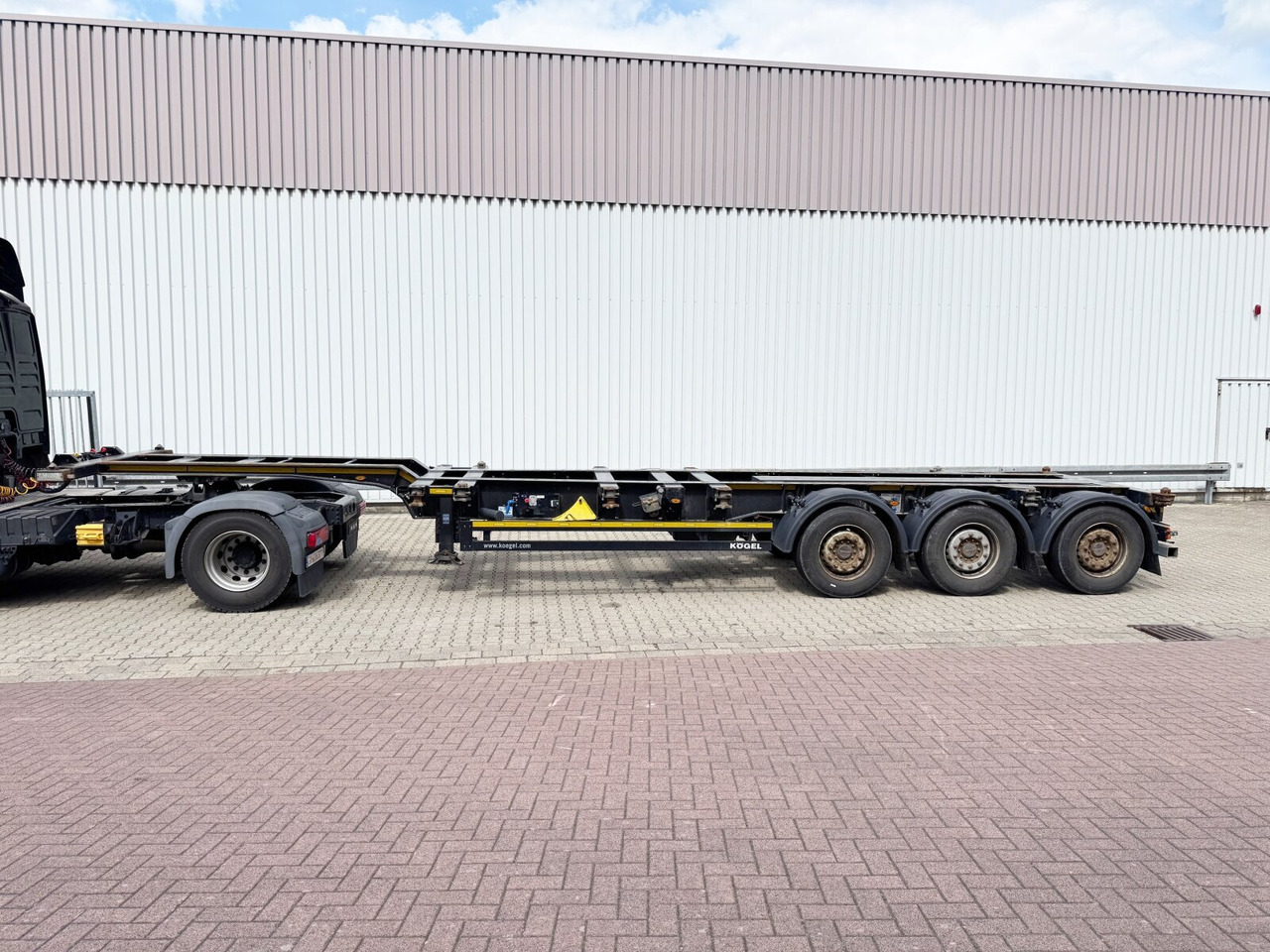 Kögel Port 45 Simplex Container-Chassis Port 45 Simplex, Container-Chassis, 20/2x20/30/40/45 Fuß, ausziehbar - نصف مقطورة: صورة 1 Kögel Port 45 Simplex Container-Chassis Port 45 Simplex, Container-Chassis, 20/2x20/30/40/45 Fuß, ausziehbar - نصف مقطورة: صورة 1