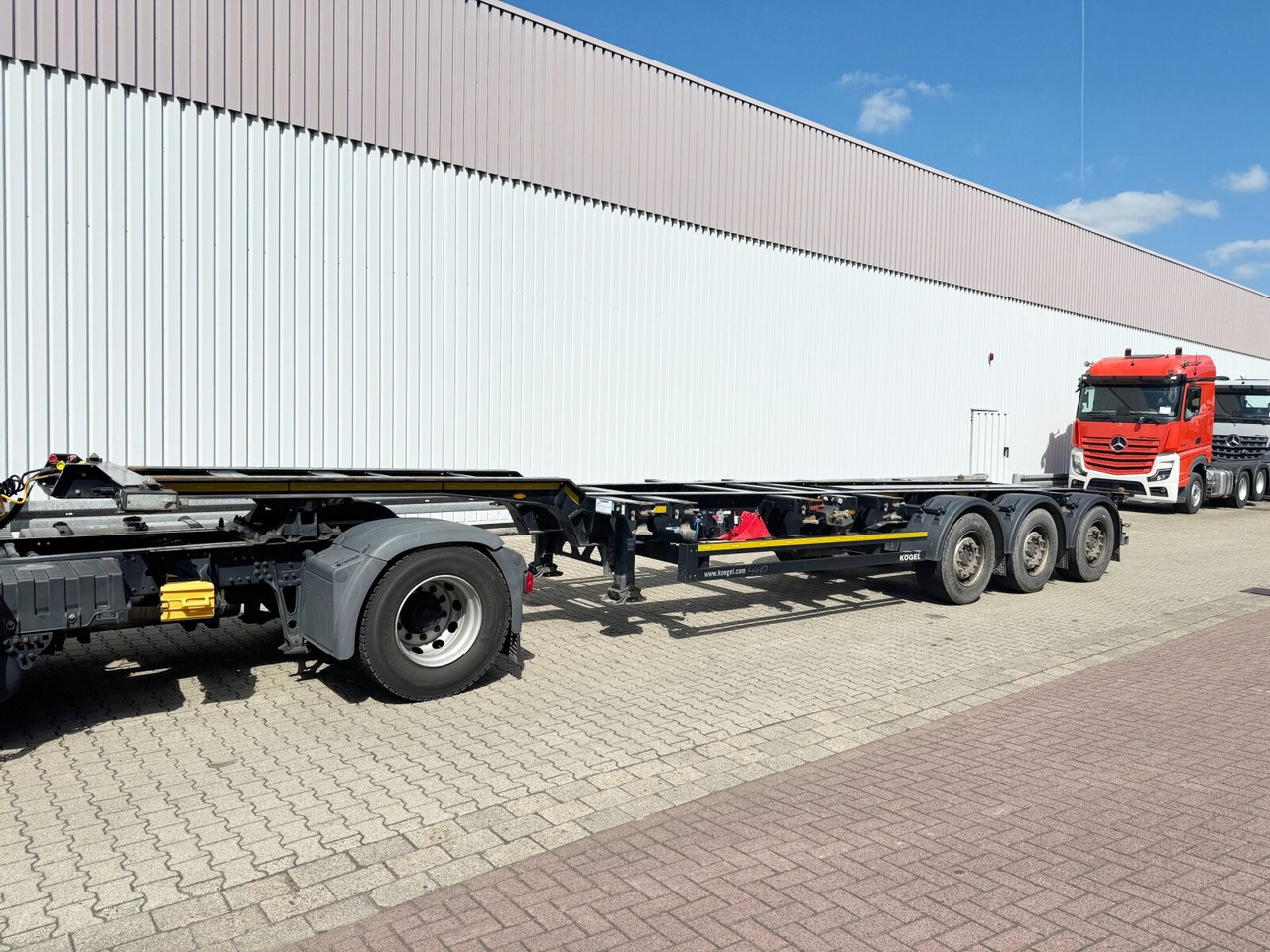 Kögel Port 45 Simplex Container-Chassis Port 45 Simplex, Container-Chassis, 20/2x20/30/40/45 Fuß, ausziehbar - نصف مقطورة: صورة 1 Kögel Port 45 Simplex Container-Chassis Port 45 Simplex, Container-Chassis, 20/2x20/30/40/45 Fuß, ausziehbar - نصف مقطورة: صورة 1