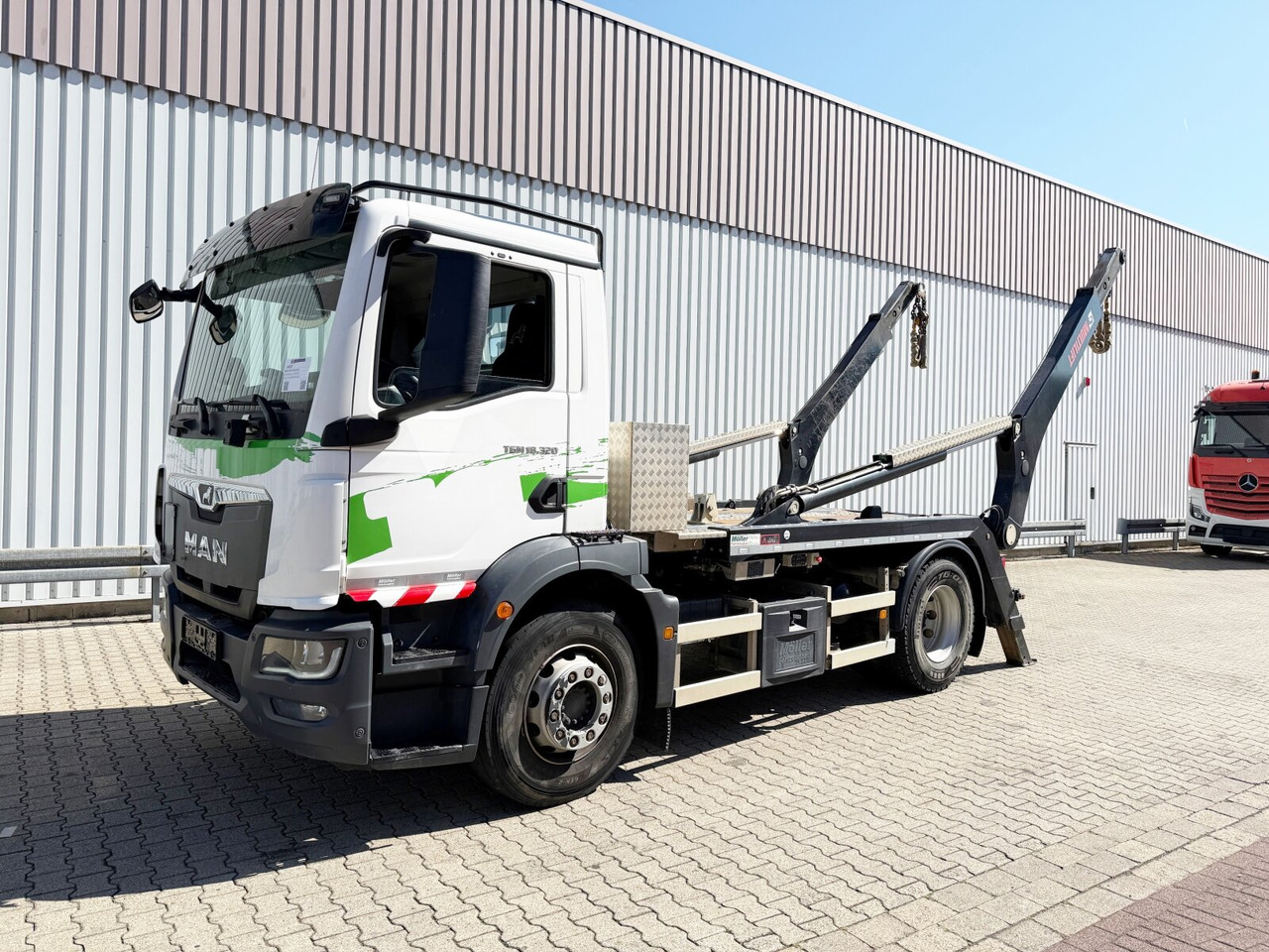 MAN TGM 18.320 4x2 BL TGM 18.320 4x2 BL, Hiab Tele-Absetzanlage, Funk - شاحنة نقل المخلفات: صورة 1 MAN TGM 18.320 4x2 BL TGM 18.320 4x2 BL, Hiab Tele-Absetzanlage, Funk - شاحنة نقل المخلفات: صورة 1