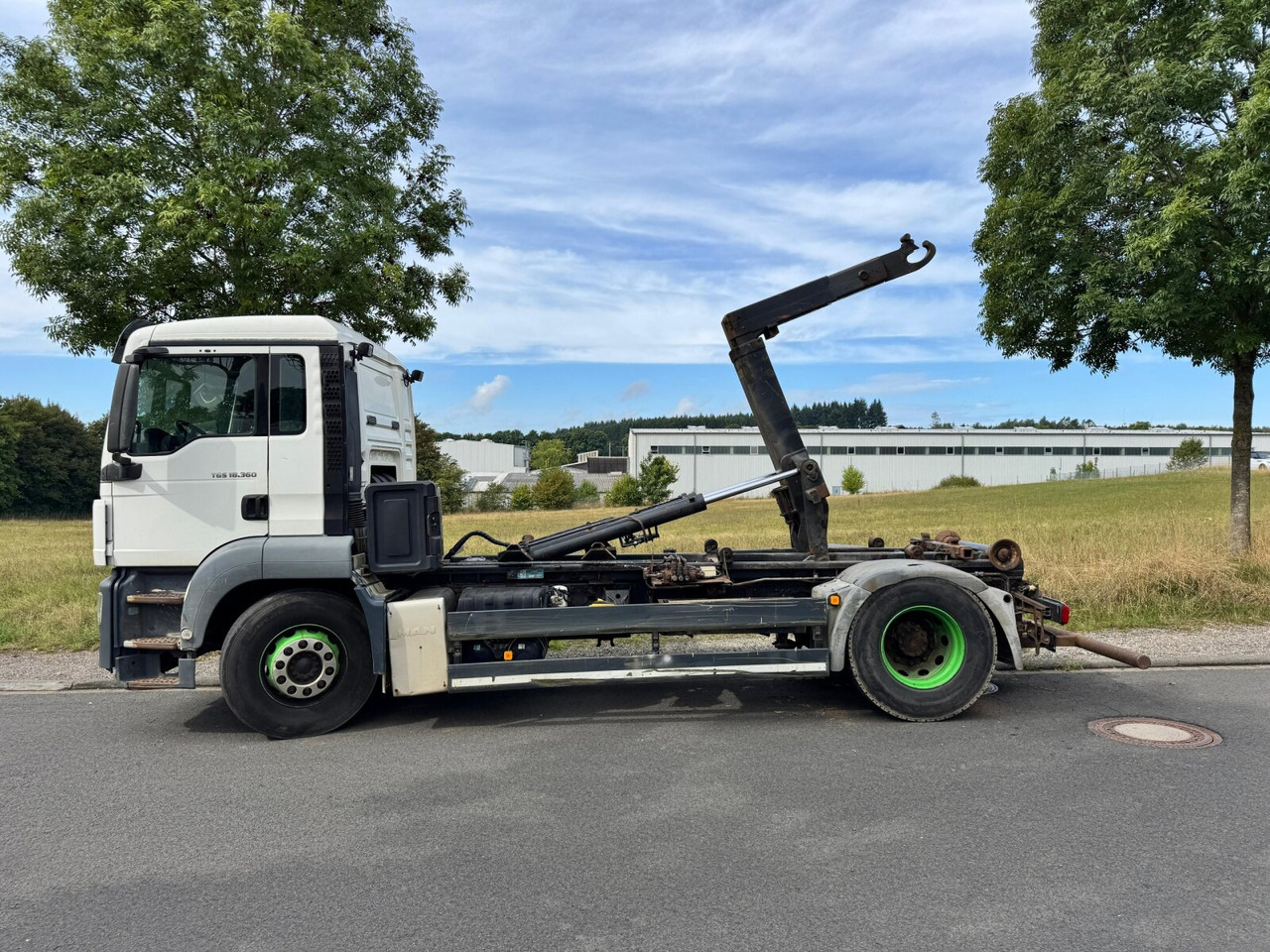 MAN TGS 18.360 4X2 BL TGS 18.360 4X2 BL, Hyva 10.45 S, Teleskopabrollanlage - شاحنة ذات خطاف: صورة 1 MAN TGS 18.360 4X2 BL TGS 18.360 4X2 BL, Hyva 10.45 S, Teleskopabrollanlage - شاحنة ذات خطاف: صورة 1