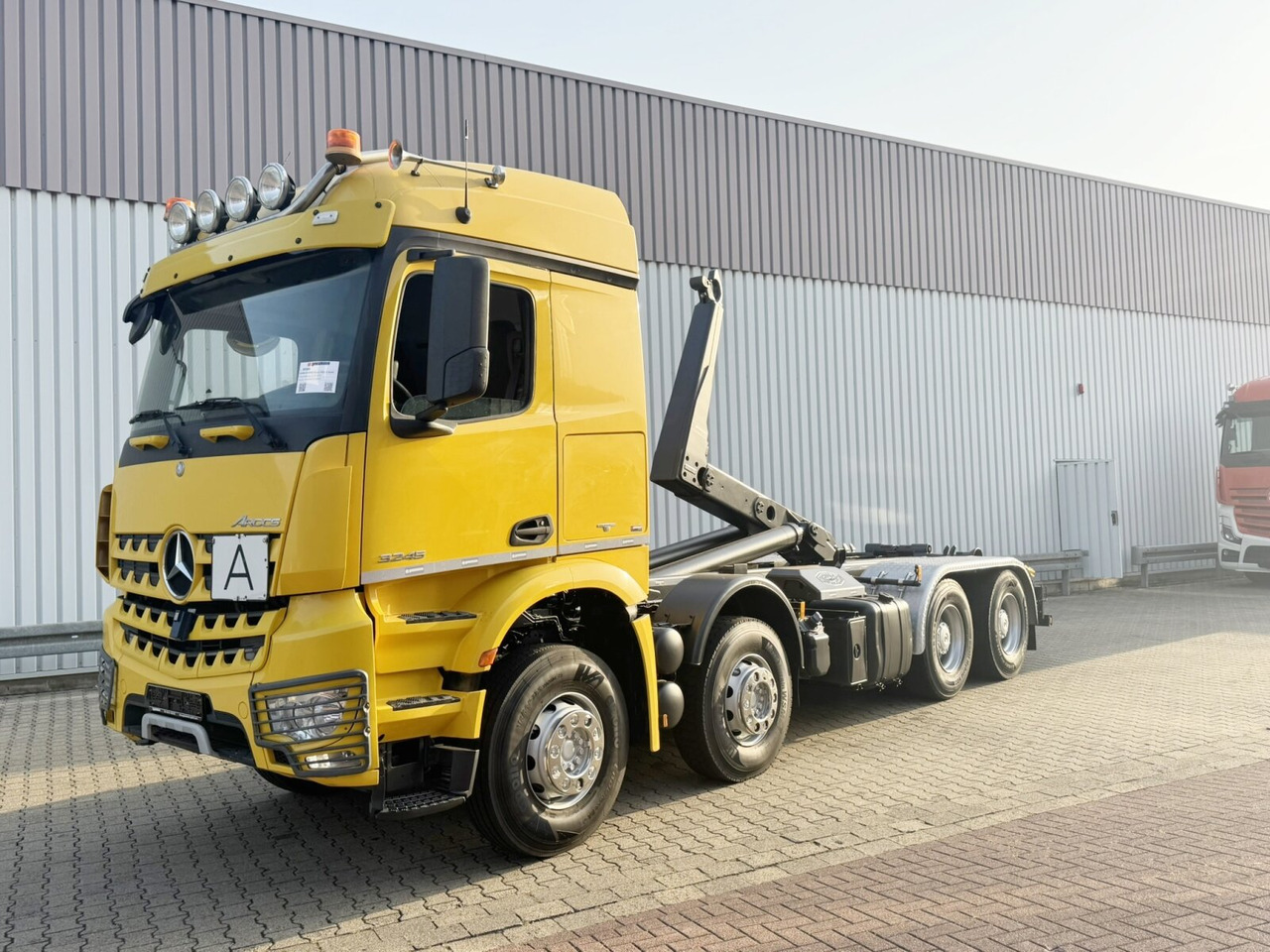 Mercedes-Benz Arocs 3245 LK 8x4/4 Arocs 3245 LK 8x4/4, Navi, Motorabtrieb, Meiller RK 30.67, Funk - شاحنة ذات خطاف: صورة 1 Mercedes-Benz Arocs 3245 LK 8x4/4 Arocs 3245 LK 8x4/4, Navi, Motorabtrieb, Meiller RK 30.67, Funk - شاحنة ذات خطاف: صورة 1