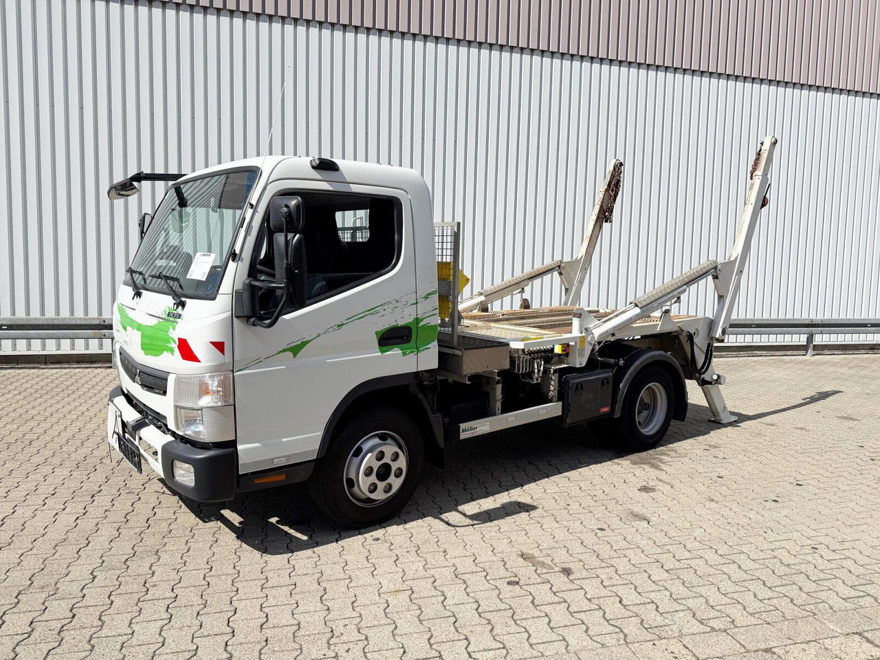 Mitsubishi Canter Fuso 7C15 4x2 Canter Fuso 7C15 4x2, Tele-Absetzer, Vereiterbar bis 10m³ - شاحنة نقل المخلفات: صورة 1 Mitsubishi Canter Fuso 7C15 4x2 Canter Fuso 7C15 4x2, Tele-Absetzer, Vereiterbar bis 10m³ - شاحنة نقل المخلفات: صورة 1