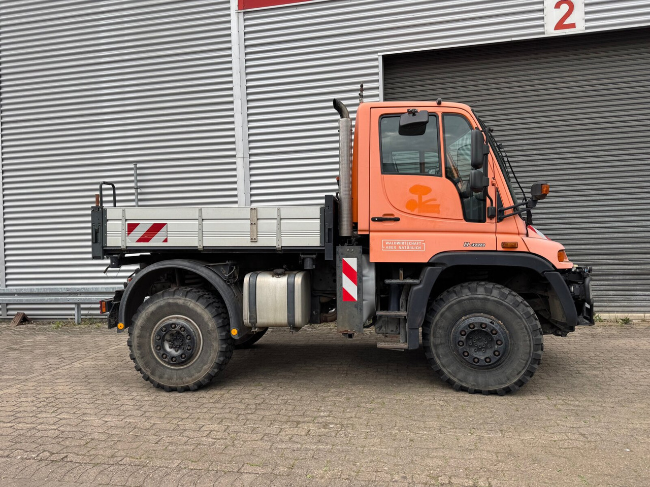 Unimog U 400 405/12 4x4 U 400 405/12 4x4, Kipper, Kommunalhydraulik, VarioPilot, Zapfwelle - شاحنة التوصيل: صورة 2 Unimog U 400 405/12 4x4 U 400 405/12 4x4, Kipper, Kommunalhydraulik, VarioPilot, Zapfwelle - شاحنة التوصيل: صورة 2