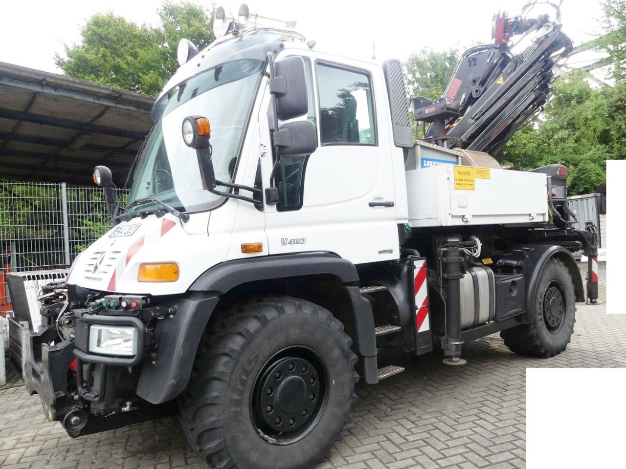 Unimog U400 4x4 U400 4x4, Frontzapfwelle, Heckkran Hiab XS 144-E4 HiDuo, Seilwinde, Funk - موبايل كرين: صورة 1 Unimog U400 4x4 U400 4x4, Frontzapfwelle, Heckkran Hiab XS 144-E4 HiDuo, Seilwinde, Funk - موبايل كرين: صورة 1