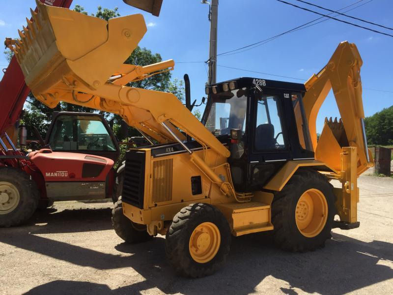 Caterpillar 428 B - جرافة حفار: صورة 1 Caterpillar 428 B - جرافة حفار: صورة 1