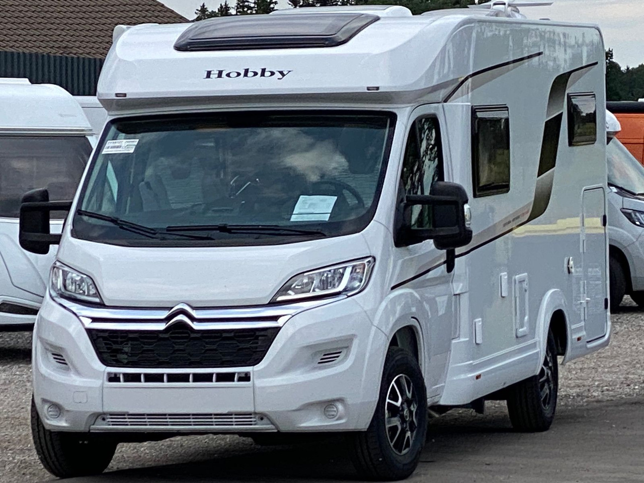 Hobby Optima Ontour Edition V65 GE Navi Markise SAT - موتر هوم شبه متكامل: صورة 1 Hobby Optima Ontour Edition V65 GE Navi Markise SAT - موتر هوم شبه متكامل: صورة 1